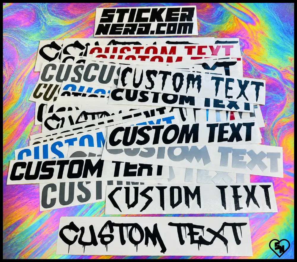 A collage of custom die-cut vinyl stickers with various stylized fonts and text, including 'CUSTOM TEXT' and 'STICKER NERD.COM', layered over a vibrant, iridescent rainbow background.