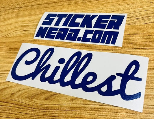 Two blue and white stickers on a wooden surface, one with 'StickerNerd.com' and the other with 'Chillest'.