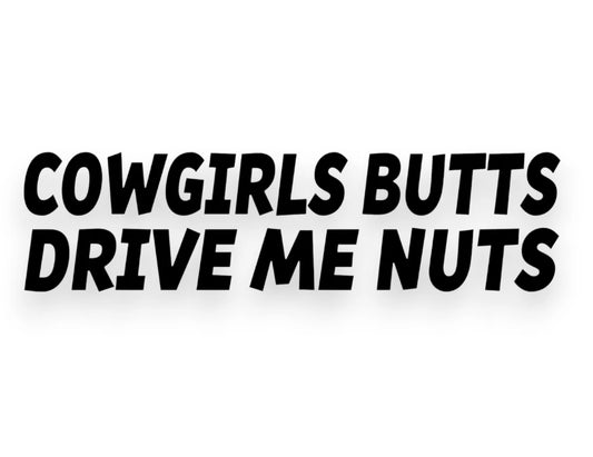 Black vinyl bumper sticker with bold, stylized text reading 'COWGIRLS BUTTS DRIVE ME NUTS' on a plain white background.
