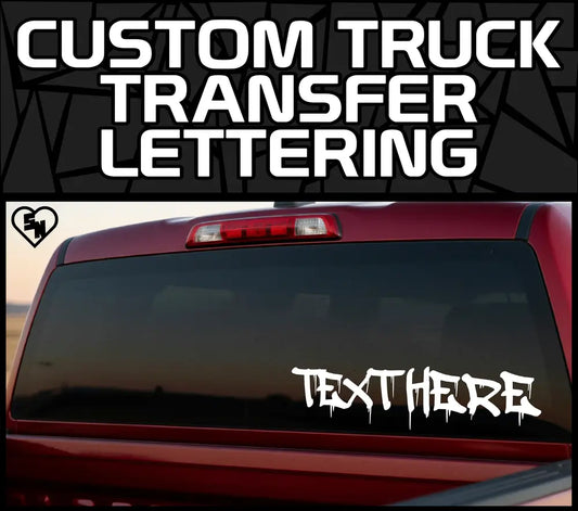 Custom truck transfer lettering decal on a car window with customizable text.
