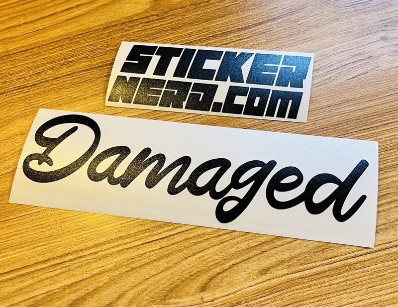 Damaged Sticker - VINYL WINDOW DECALS - STICKERNERD.COM