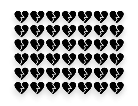 A sticker pack sheet featuring a grid of small, black broken heart vinyl decals with a jagged crack down the middle on a white background.