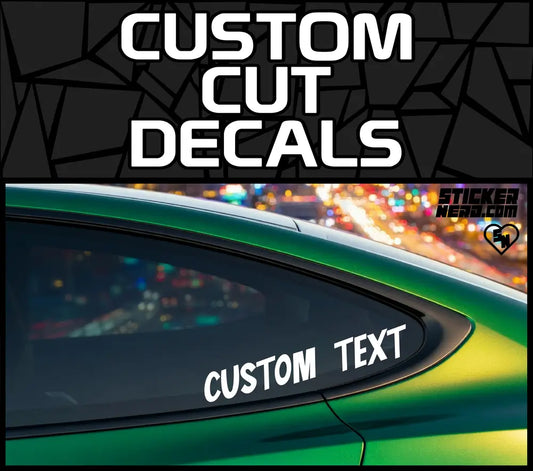 Custom Cut Decals banner graphic showing white vinyl "CUSTOM TEXT" lettering applied to the rear side window of a green car.